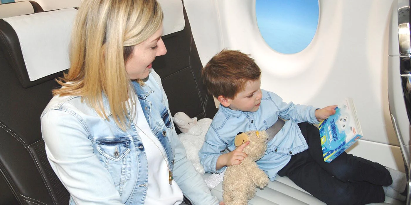 Toddlers Entertained on the Plane